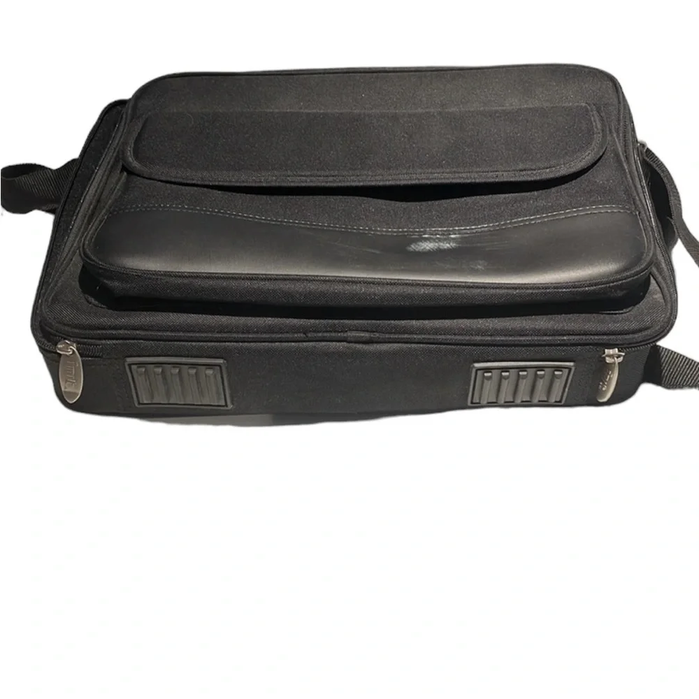 Black canvas init laptop bag. Black. Gently worn.